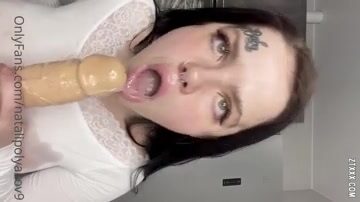 Natali Polyakova masturbating her dildo with her big tits